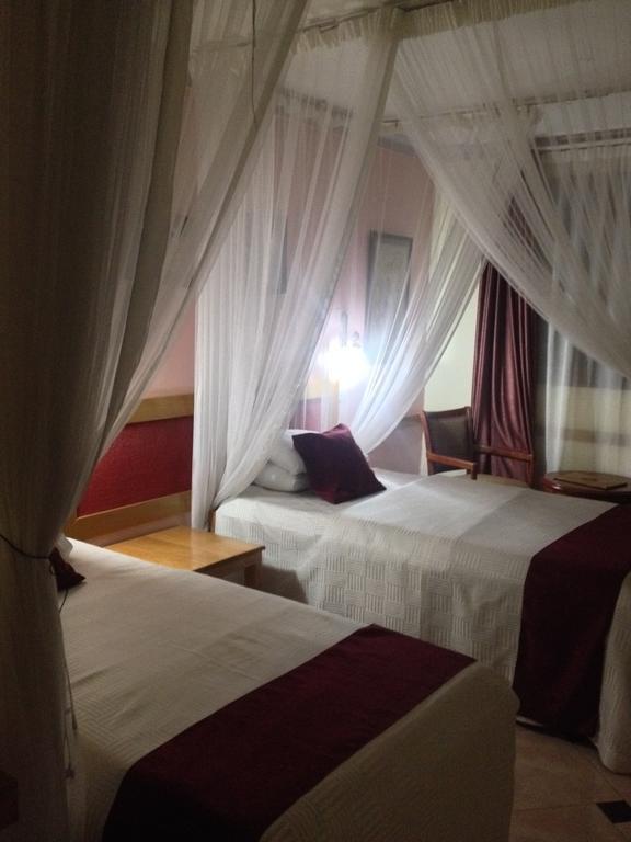 J Residence Motel Entebbe Quarto foto